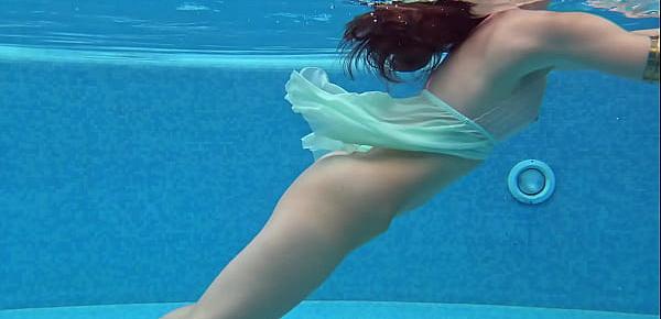  Sexiest petite teen Lizi Vogue swims naked in the pool